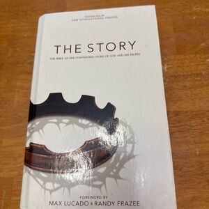 The Story Hardcover Book - White Cover with Brown Crown Graphic
